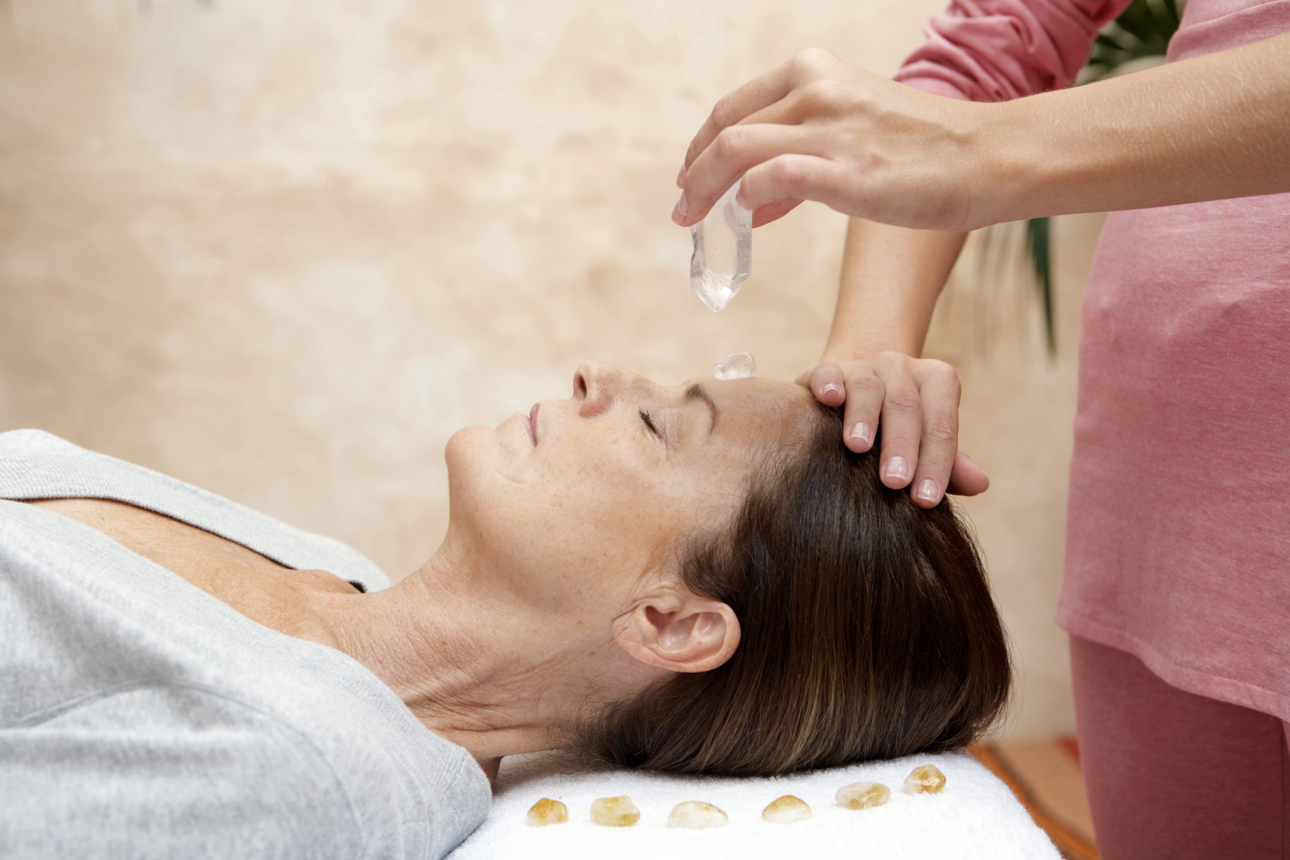 Practitioner Providing Crystal Therapy | CalmNest